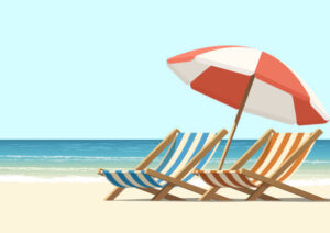 Summer, sun, waves, and cozy beach chairs under umbrella